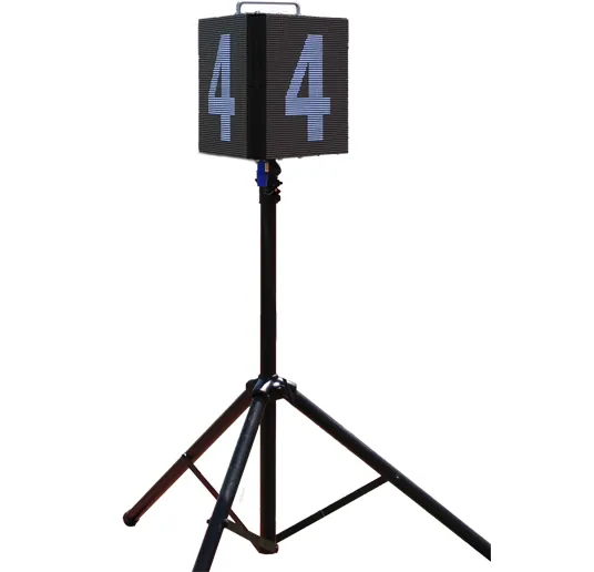 The three-sided lap counter on its tripod showing 4